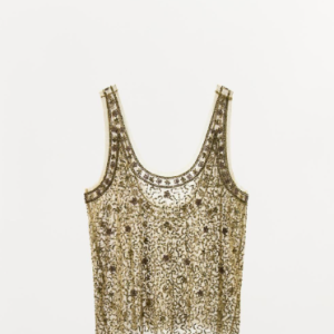 Top dorado brillante